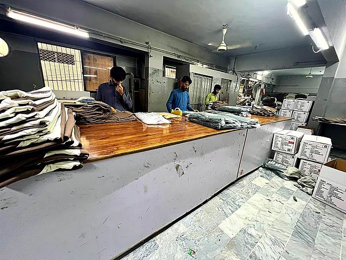 Final packing table with garments ready for export