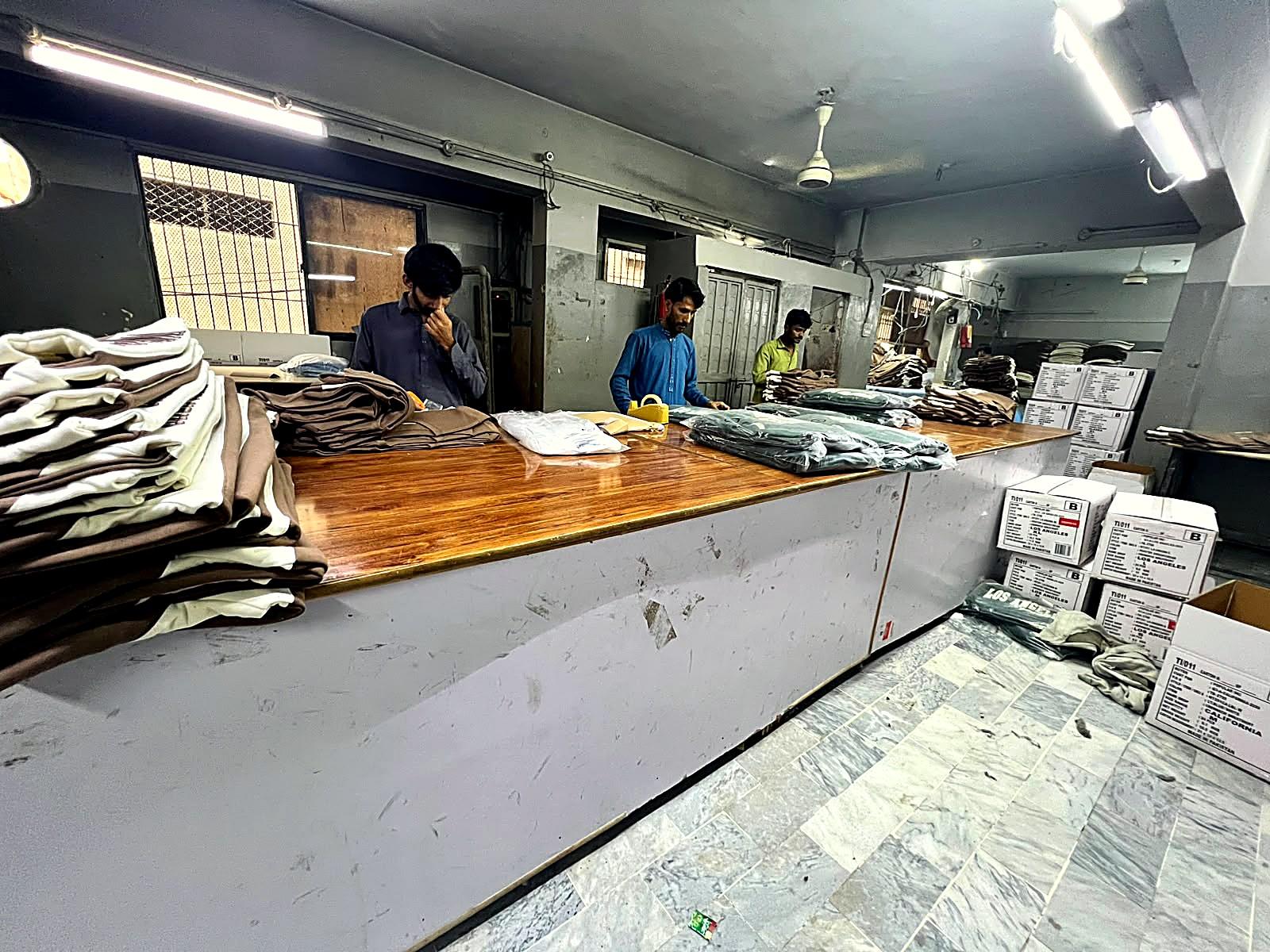 Final packing table at Fine Apparels